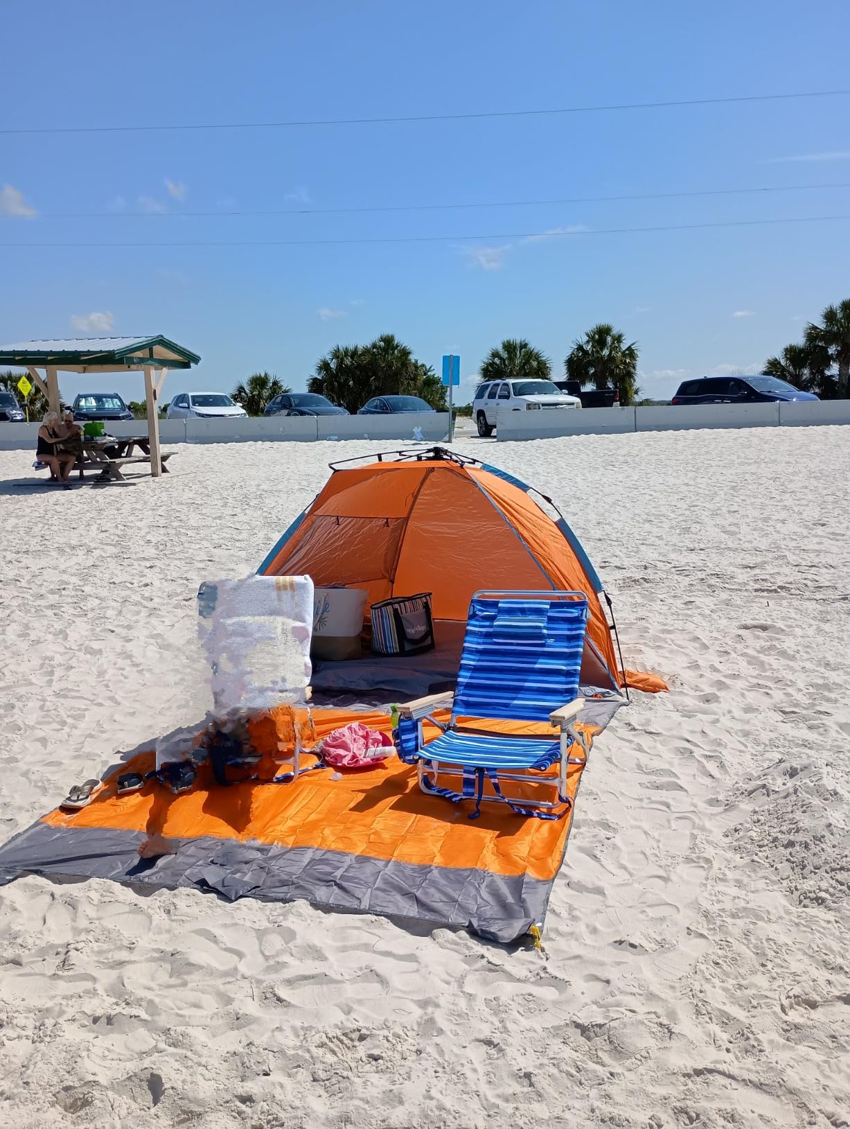 Oileus X-Large 4-Person UV Beach Tent with 6 Sand Pockets, Orange | Quick setup shade includes a carrying bag, stakes and weighted corners for windy days, fishing trips, hiking and camping. customer photo 2
