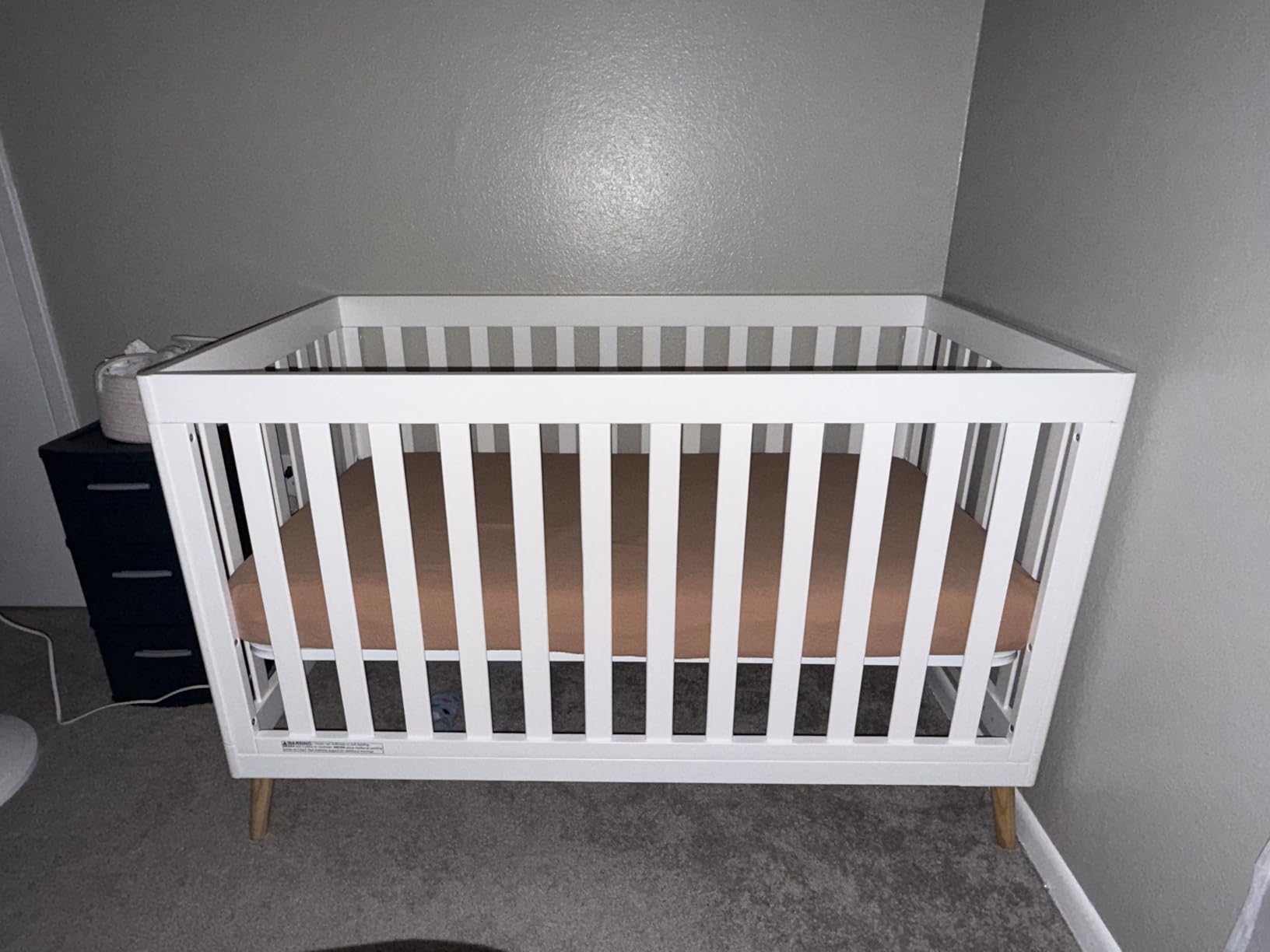 Delta Children Essex 4-in-1 Convertible Baby Crib, Bianca White with Natural Legs customer photo 2