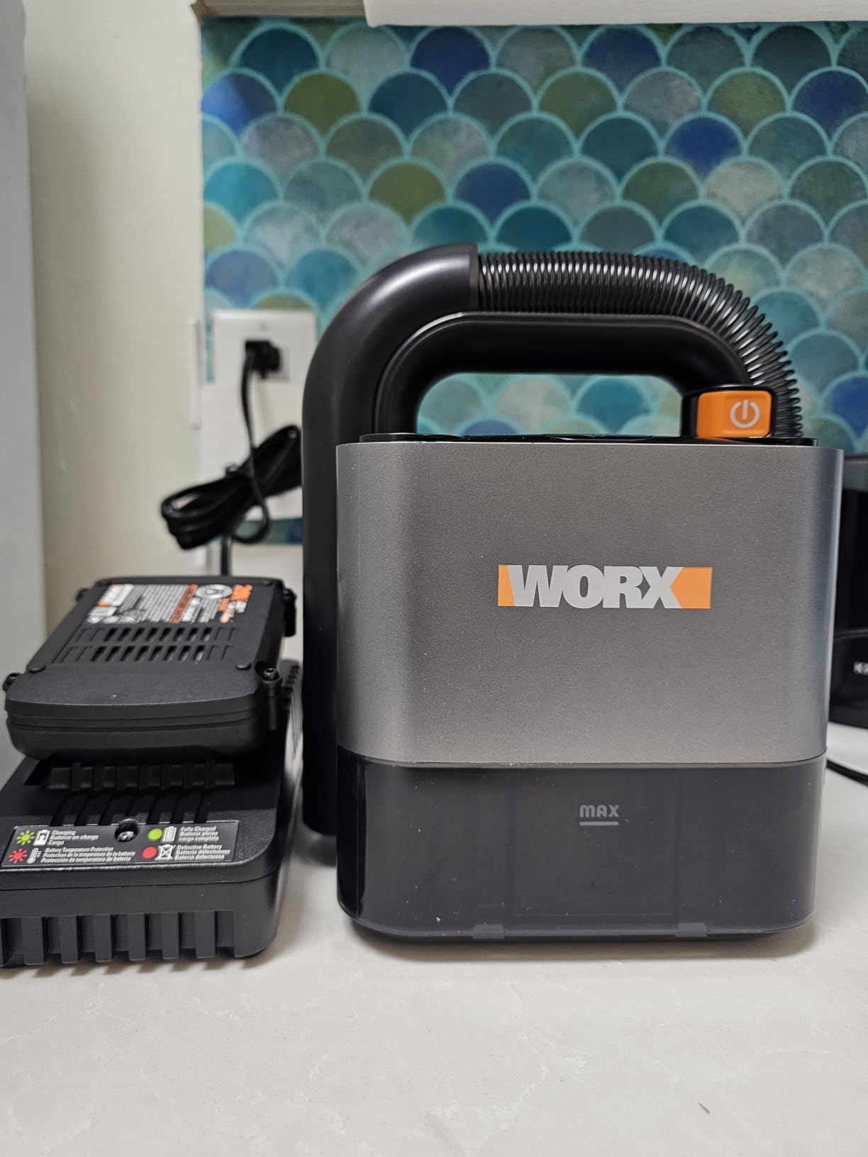 Worx Cordless Cube Vac Compact Vacuum, 20V, WX030L | Compact on-the-go cleaning; holds 6oz of dry debris; 2-speeds; Battery & Charger Included; PowerShare customer photo 2