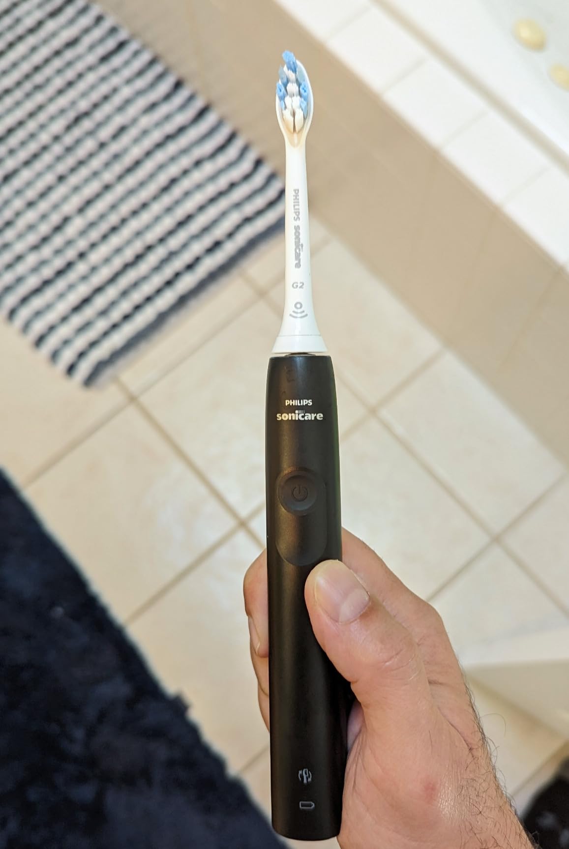 Philips Sonicare 4100 Rechargeable Electric Toothbrush, 1 Brush Head, Black | 700% More Plaque Removal, Pressure Sensor, 2 Brush Settings, 2-Minute Guided Timer, 14-Day Battery, HX3681/24 customer photo 2