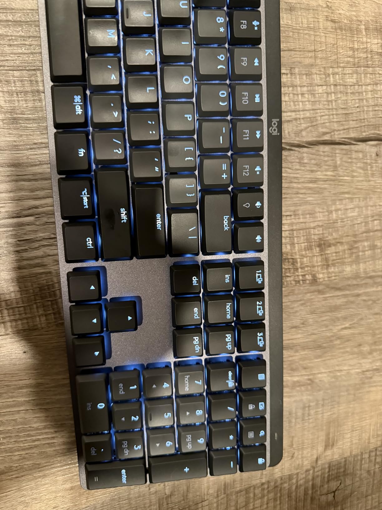 Logitech MX Mechanical Wireless Illuminated Keyboard Tactile - Graphite | Low-profile full-size, 3 device Bluetooth pairing, Smart backlight auto-adjusts, USB-C rechargeable, Up to 15 day battery customer photo 2