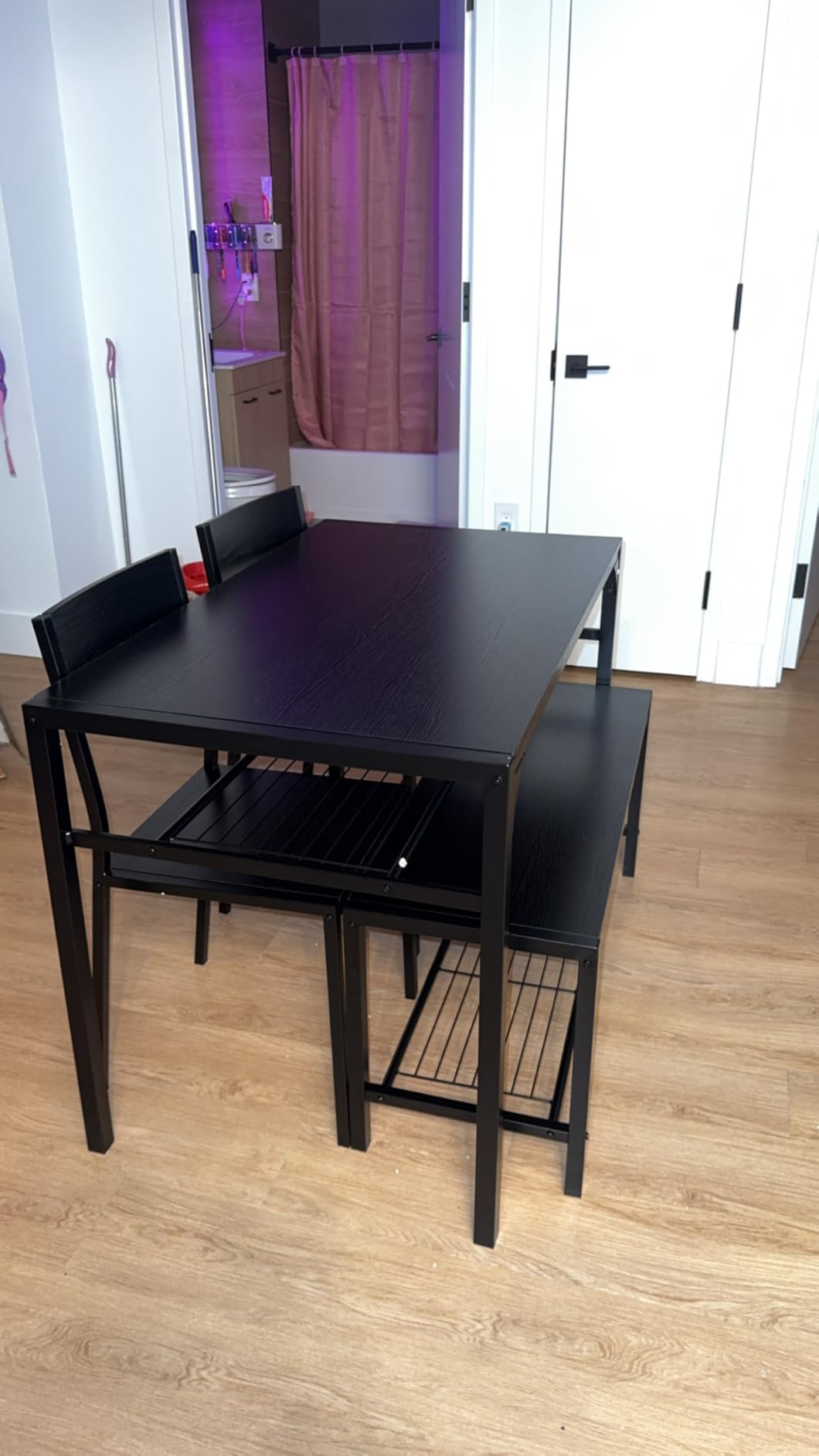 Gizoon 4-Piece Dining Table Set for 4, Kitchen Table with Bench Black | Space-saving black 4-piece dinette set with metal storage rack. Includes 2 ergonomic chairs and 1 bench. customer photo 1