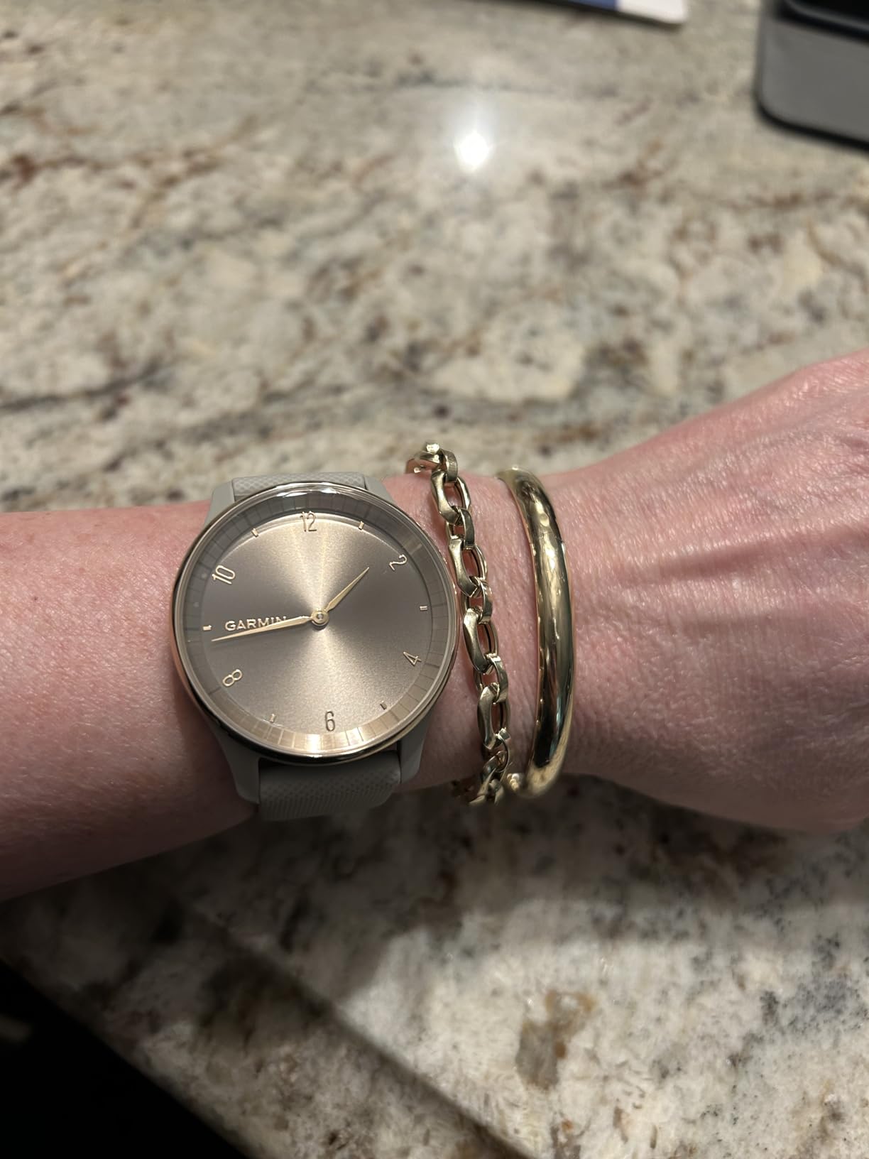 Garmin Vivomove Trend, Stylish Hybrid Smartwatch, Long-Lasting Battery Life, Dynamic Watch Hands and Touchscreen Display, Ivory (Renewed), Adjustable customer photo 2