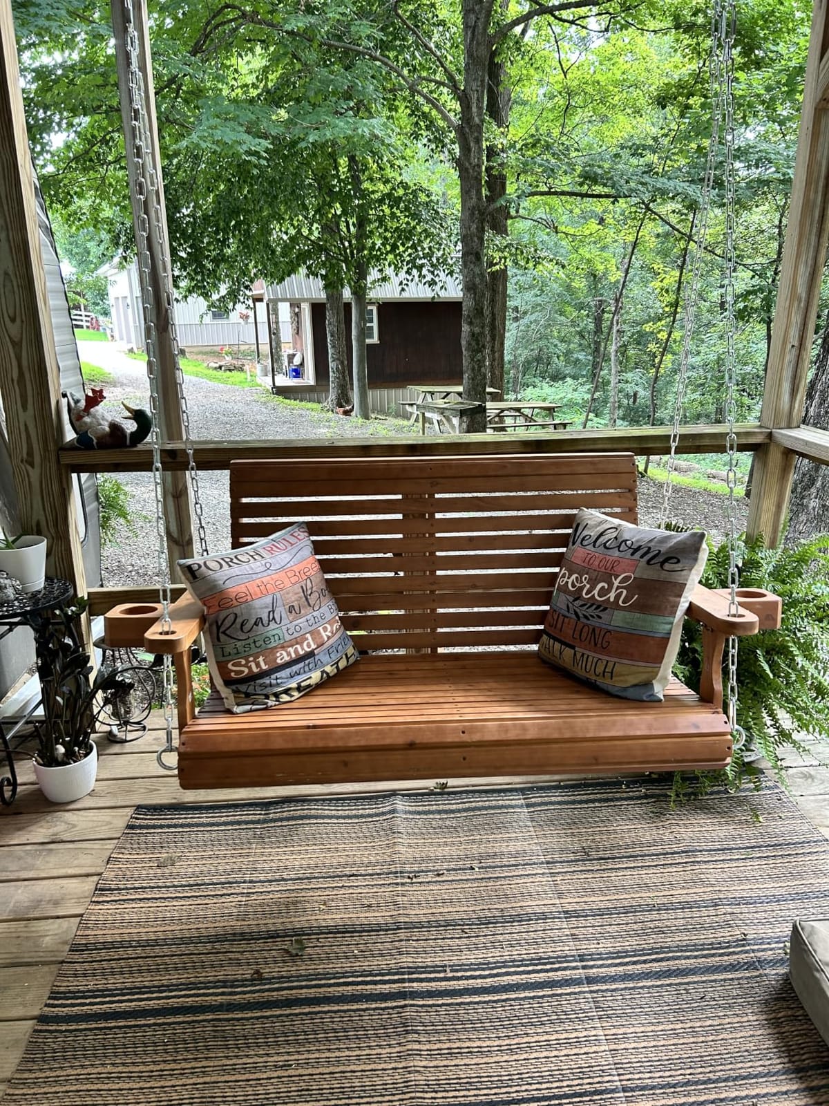 Wooden Porch Swing 2-Seater, High Backrest and Deep Seat, Bench Swing with Cupholders, Hanging Chains and 7mm Springs, Heavy Duty 880 LBS, for Outdoor Patio Garden (Cedar Tone - 4 FT Extra Large) customer photo 1