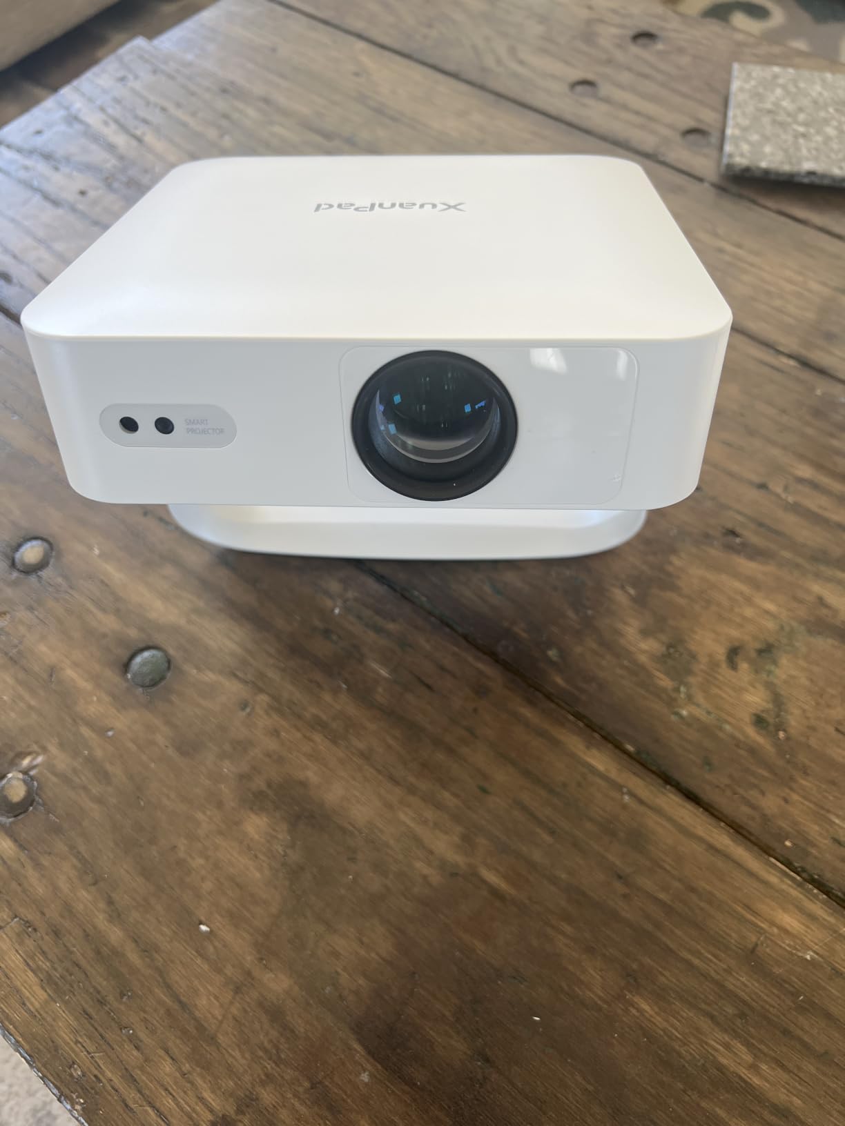 Officially-Licensed App & Auto Focus White Smart Mini Projector with WiFi and Bluetooth, XuanPad 4K Support Movie Projector, Portable Native 1080P Outdoor Projector with 360° Stand customer photo 1