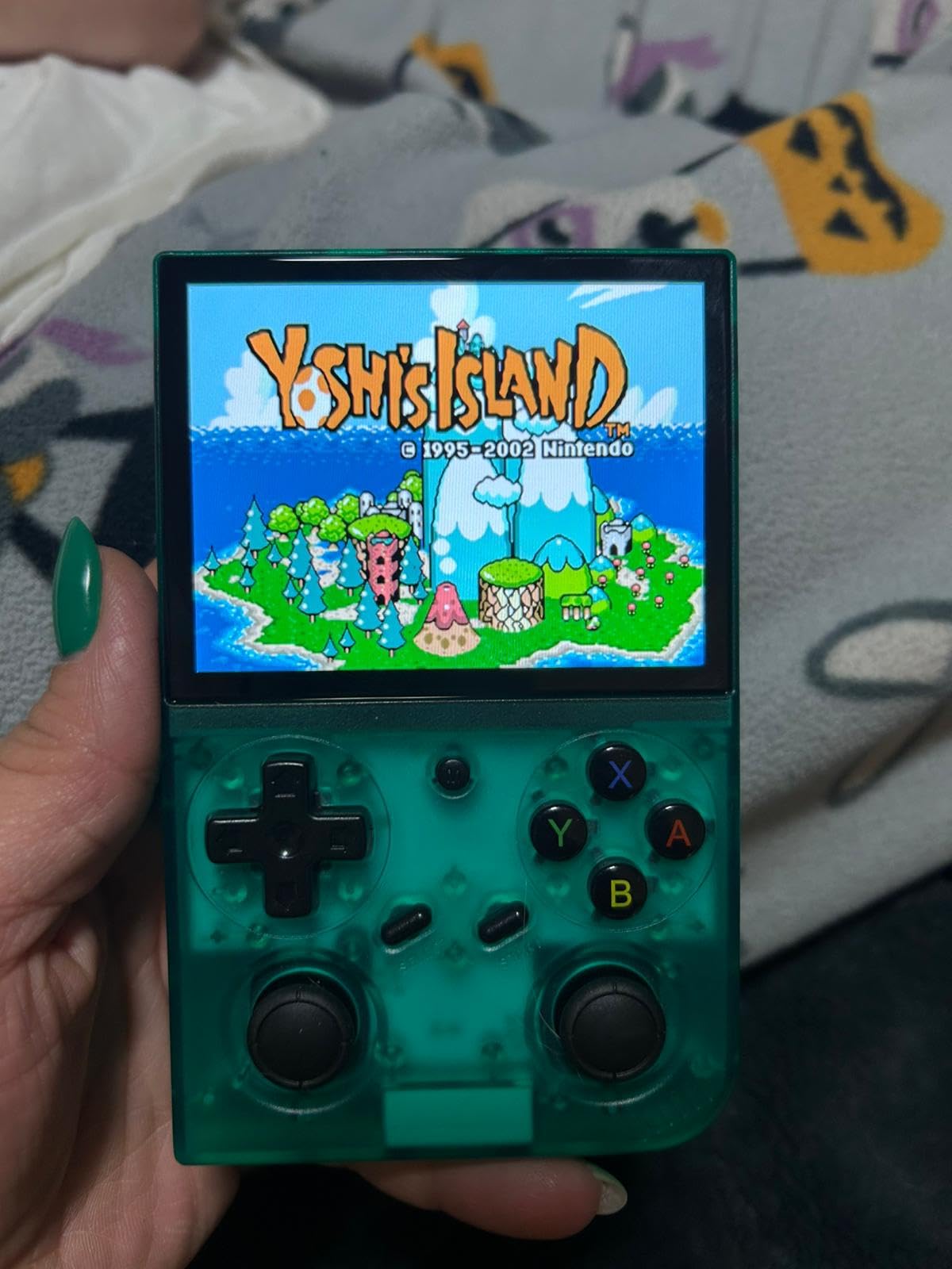 RG35XX Pro - Retro Handheld Game Console, 3.5-Inch IPS Screen, Linux OS, 64GB Card, 3200mAh Battery, WiFi & Bluetooth, HDMI Output, Includes Screen Protector & Keychain (Transparent Teal) customer photo 1