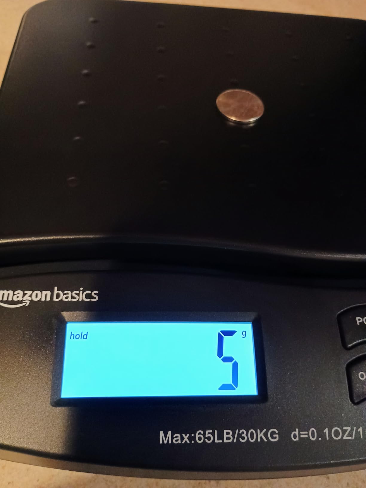 Amazon Basics Digital Postal Shipping Scale with Tare Function, AC Adapter, 65 lb Capacity, 0.1 oz Readability, LCD Display, Black customer photo 1