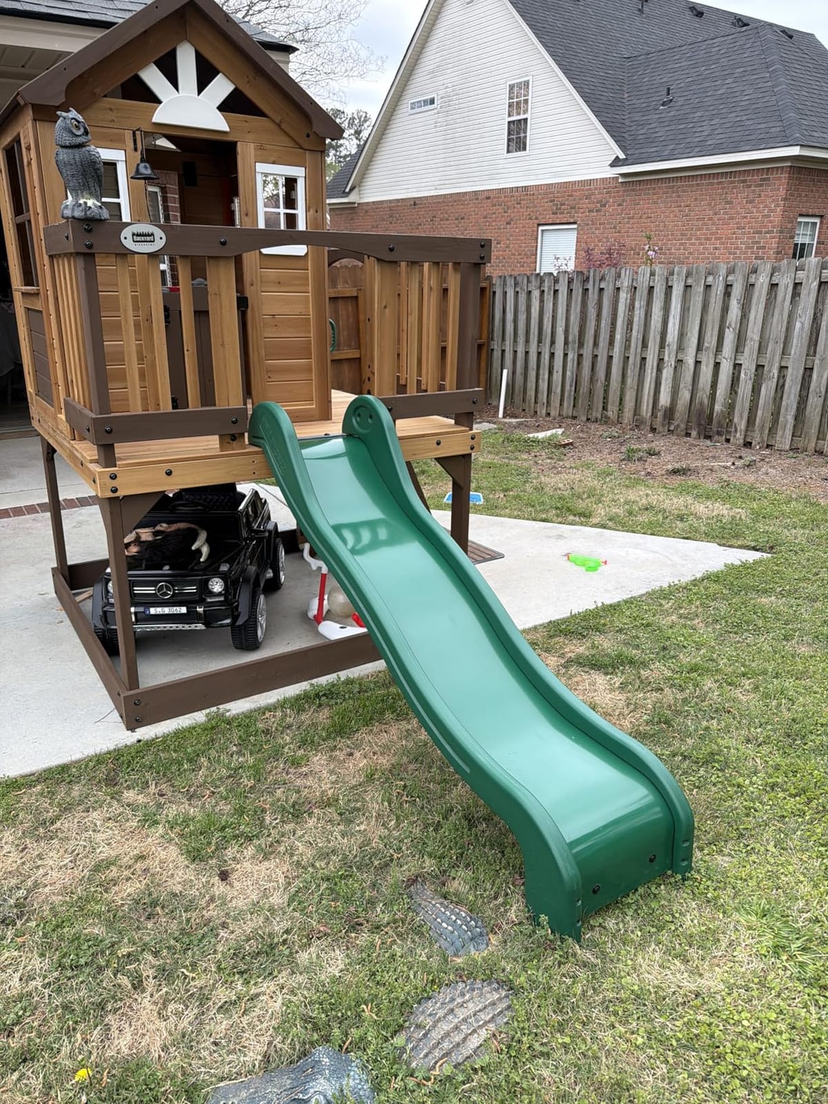 Backyard Discovery Echo Heights Elevated Cedar Wooden Kids Playhouse with Wave Slide, Play Kitchen, Wrap-Around Deck, Flat-Step Ladder, Half Door, Windows, Bell, and Growth Chart for Outdoor Play customer photo 1
