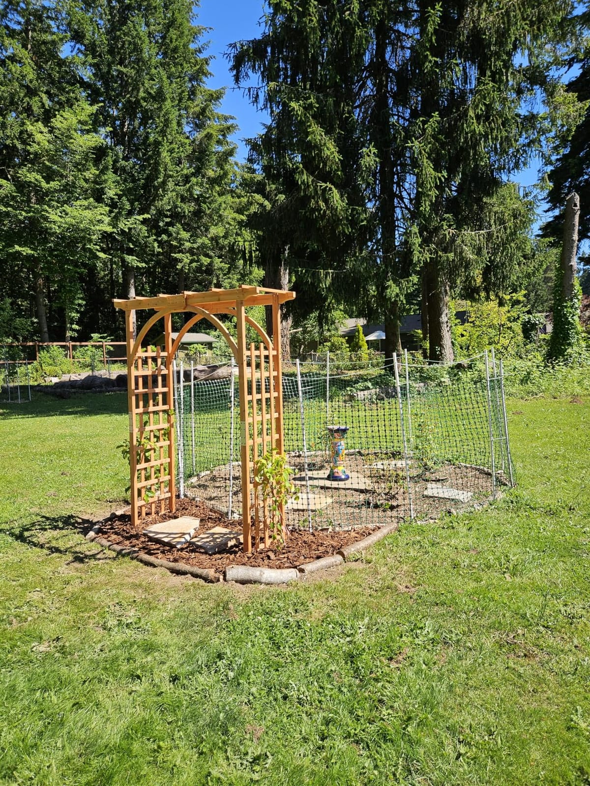 Yaheetech 85in Wooden Garden Arch Arbor Trellis for Backyard Patio Outdoor | Metal-reinforced fir wood arch with lattice sides supports climbing roses, wisteria, and vines as a walk-through entrance. customer photo 2