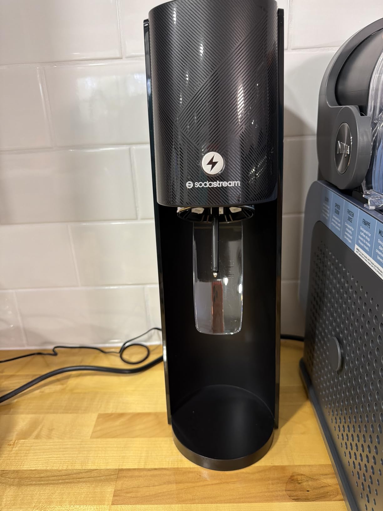 SodaStream - E-TERRA Soda Maker | VALUE BUNDLE | 3 Automatic Carbonation Levels | Includes 2x CO2 Cylinders, 3x 32 Fl Oz Dishwasher Safe Bottles, 2x Bubly Fruit Flavor Drops, 1x Power Adapter | Black customer photo 1