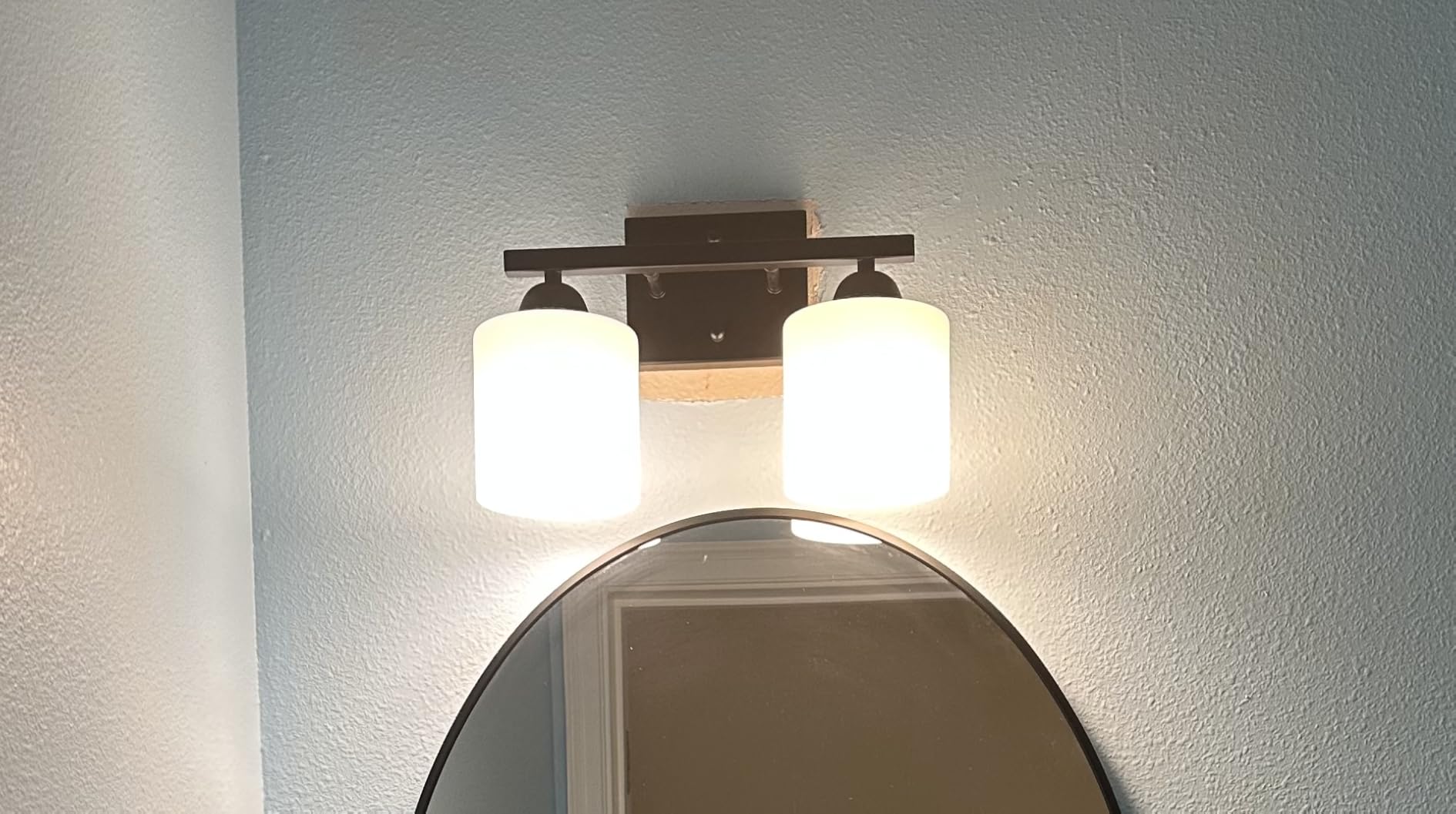 Mecgirn Matte Black Milk Glass Wall Sconces, 1 Pack Hardwired Indoor Wall Light Fixtures for Living Room, Hallway, Bedroom, Ceramic E26 Sockets (Bulbs Not Included) customer photo 2